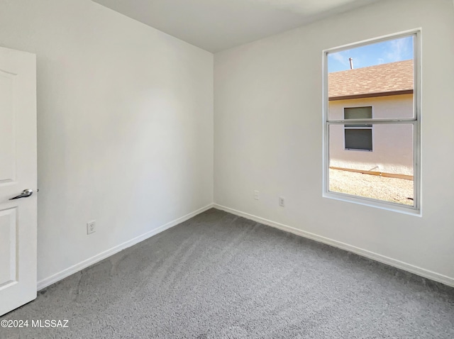 view of carpeted spare room