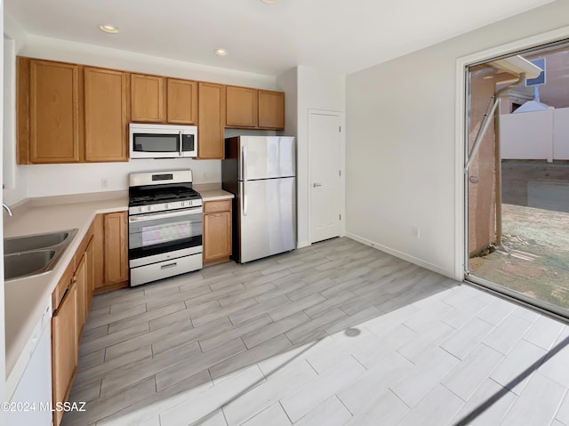 kitchen with sink and white appliances