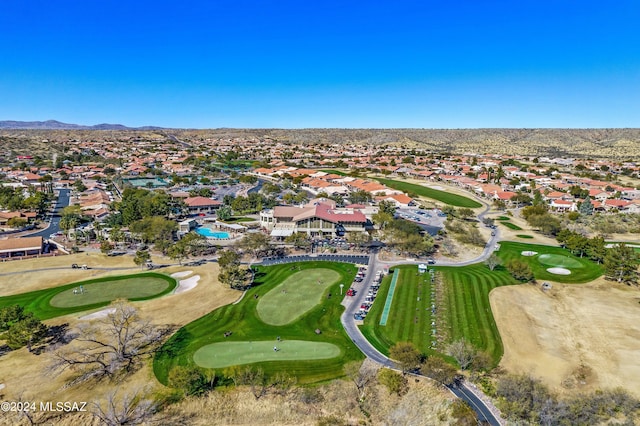 birds eye view of property featuring a mountain view