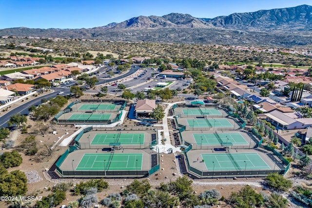 birds eye view of property featuring a mountain view