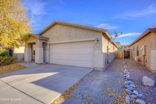 view of front of home with a garage