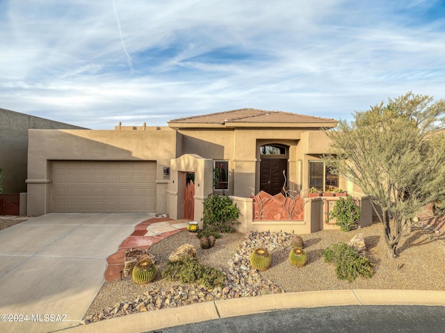 view of front of home with a garage