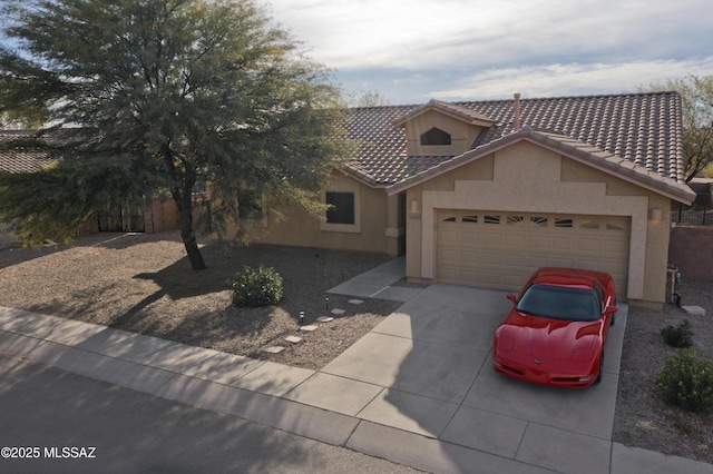 view of front of home with a garage