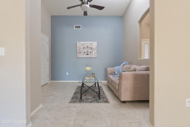 living room with ceiling fan