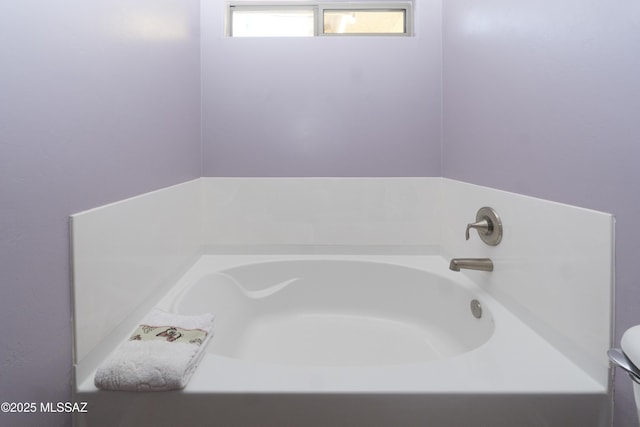 bathroom with a bathing tub