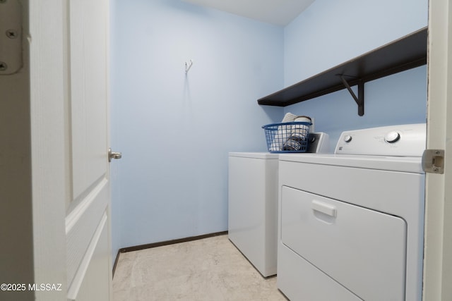 laundry area featuring washer and clothes dryer