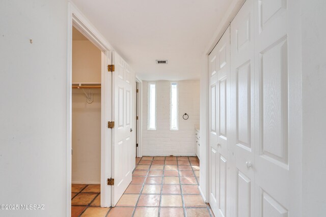 doorway to outside featuring light tile patterned floors