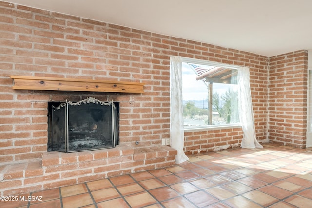 details with a brick fireplace