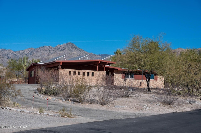 view of front of house with a mountain view