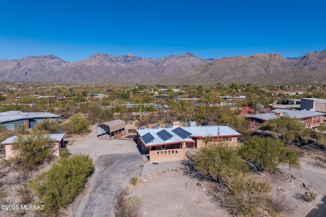 drone / aerial view featuring a mountain view