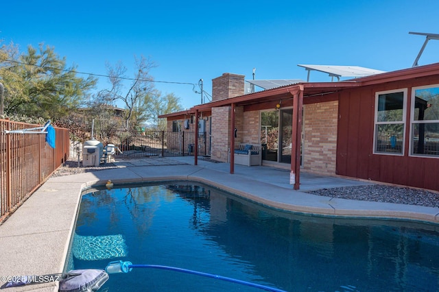 view of pool with a patio area