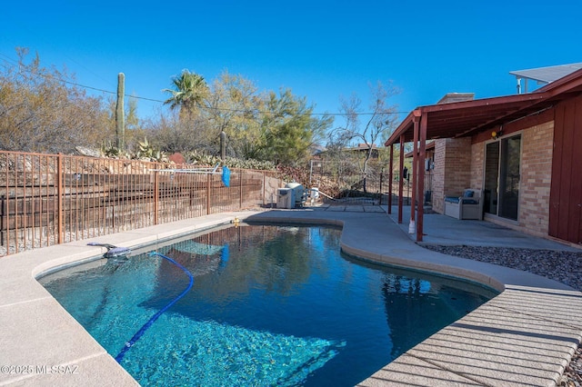 view of pool with a patio