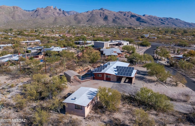 drone / aerial view featuring a mountain view