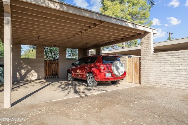 view of car parking featuring a carport