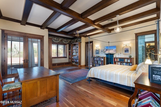 bedroom featuring beam ceiling, access to exterior, french doors, and wood-type flooring