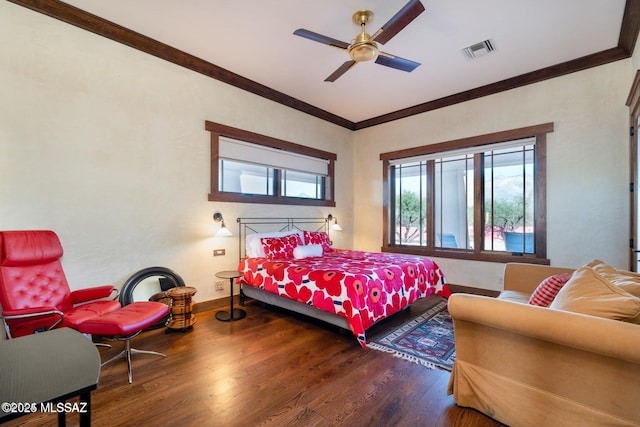 bedroom featuring ceiling fan, hardwood / wood-style floors, and ornamental molding