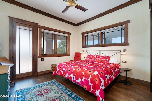 bedroom with ceiling fan, dark hardwood / wood-style floors, and crown molding