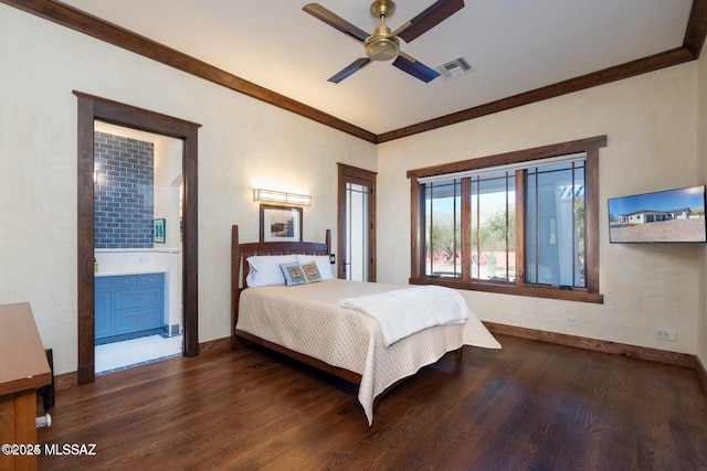 bedroom featuring ceiling fan, dark hardwood / wood-style floors, ornamental molding, and connected bathroom