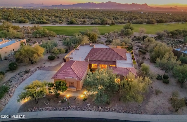 aerial view at dusk with a mountain view