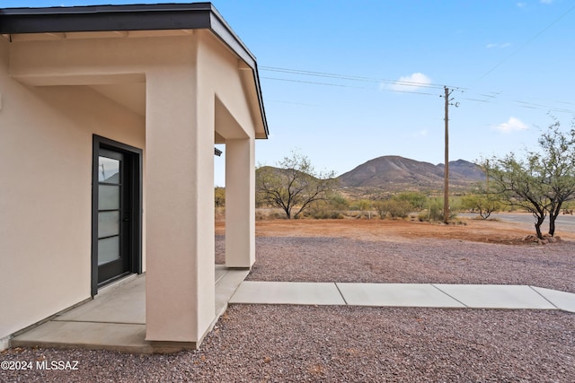 exterior space featuring a mountain view