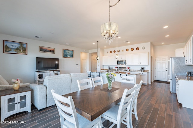 dining room featuring an inviting chandelier