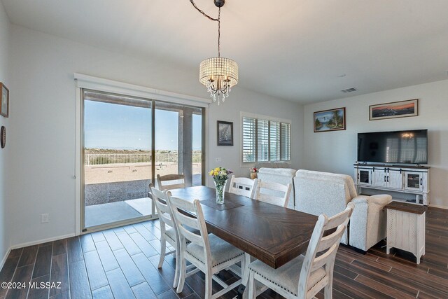 dining area with a chandelier