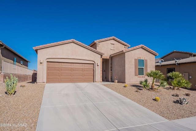 view of front of property with a garage