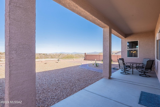 view of patio with a mountain view