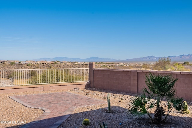 view of patio featuring a mountain view