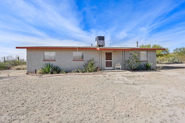 single story home featuring central AC