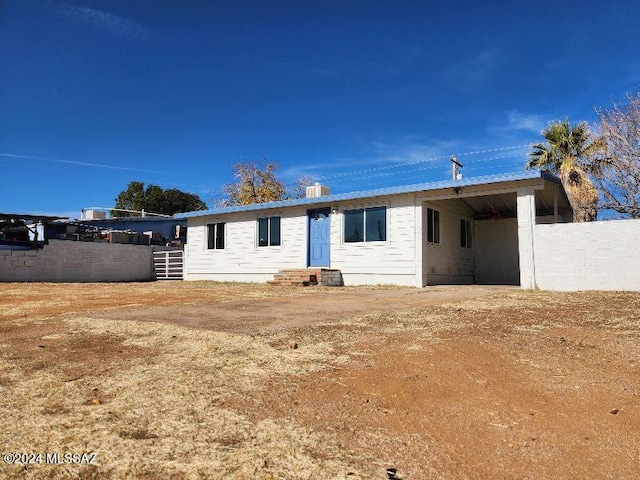 view of front of house featuring a carport