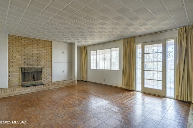 unfurnished living room with a fireplace