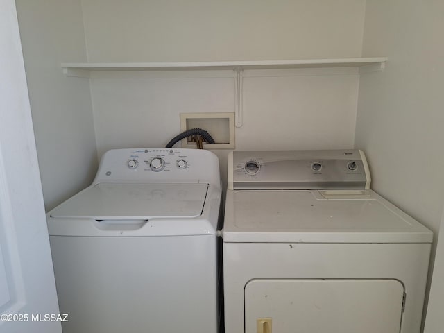 laundry room featuring independent washer and dryer