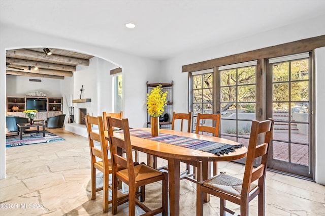 dining room featuring beam ceiling