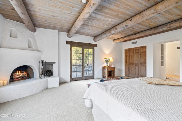 bedroom featuring carpet, wooden ceiling, a fireplace, and french doors