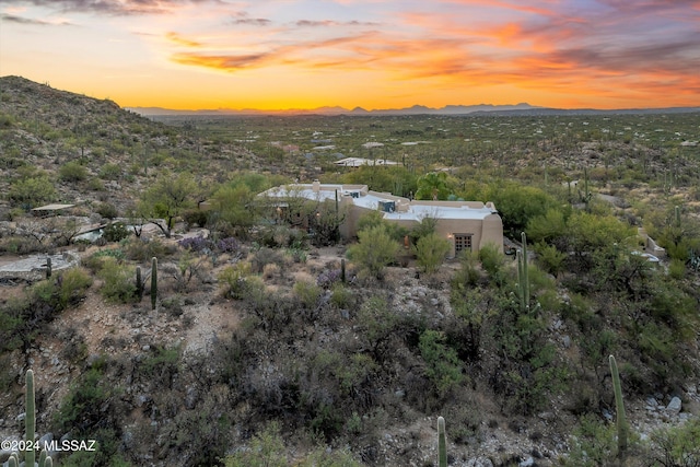 aerial view at dusk with a mountain view