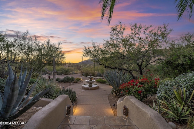 patio terrace at dusk with a mountain view