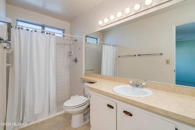 full bath featuring vanity, tile patterned flooring, a shower stall, and toilet