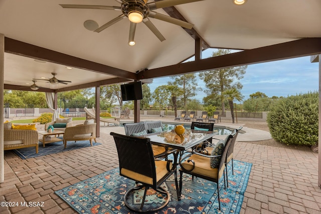 view of patio / terrace with ceiling fan and outdoor lounge area