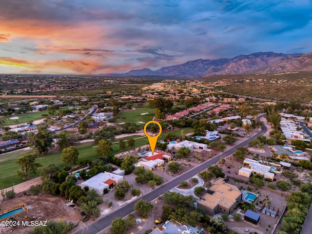 aerial view at dusk with a mountain view