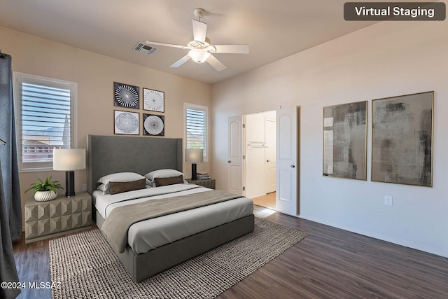 bedroom with wood-type flooring and ceiling fan