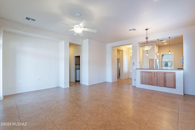 interior space featuring ceiling fan and light tile patterned floors