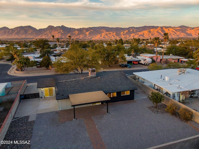 aerial view at dusk with a mountain view