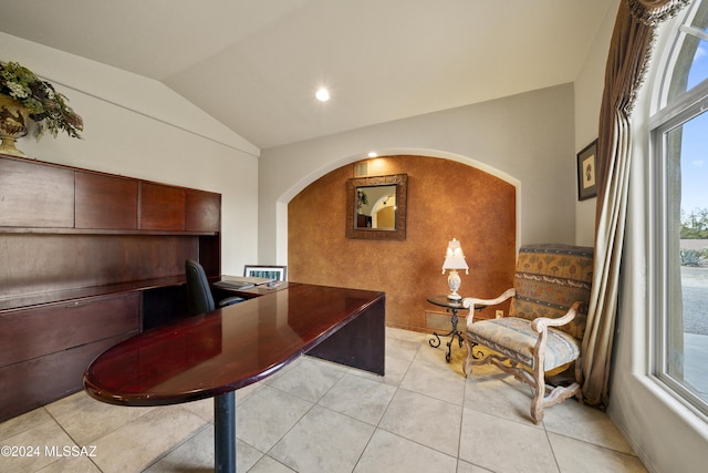 tiled office with vaulted ceiling