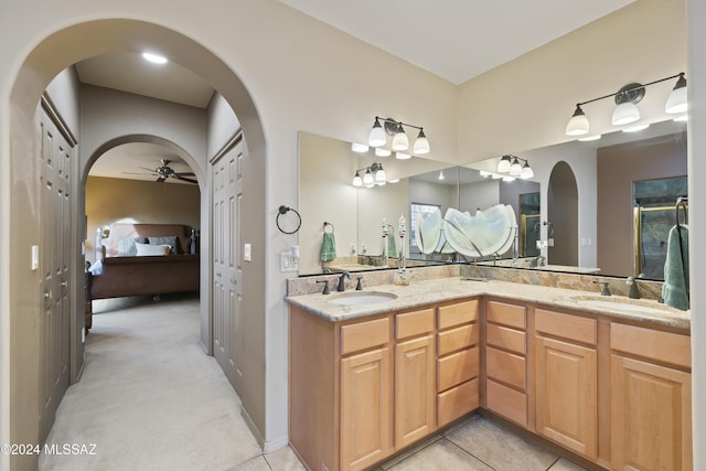 bathroom featuring vanity, tile patterned floors, and ceiling fan