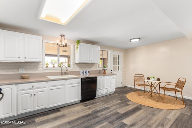 kitchen featuring dishwasher, a healthy amount of sunlight, white cabinetry, and sink