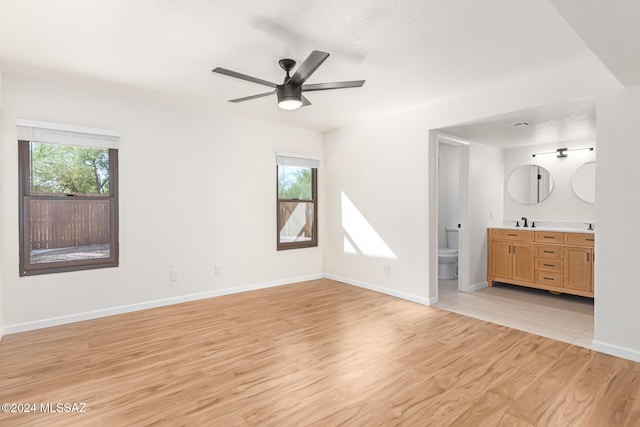 interior space featuring light wood-type flooring and a wealth of natural light