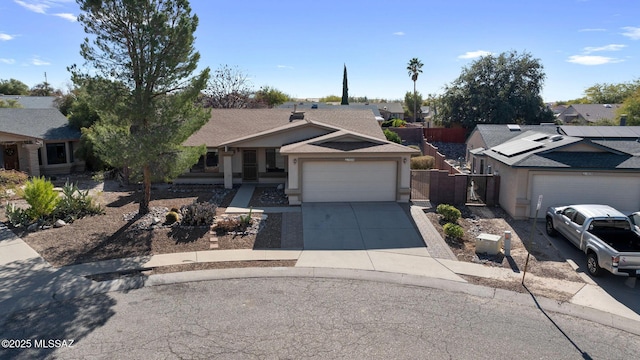 ranch-style home with a garage