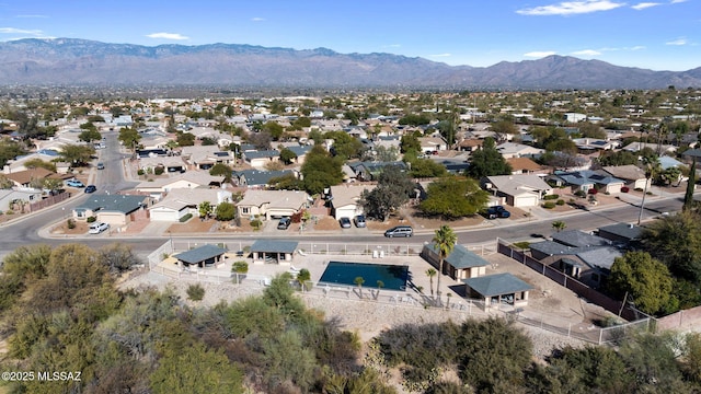 drone / aerial view featuring a mountain view