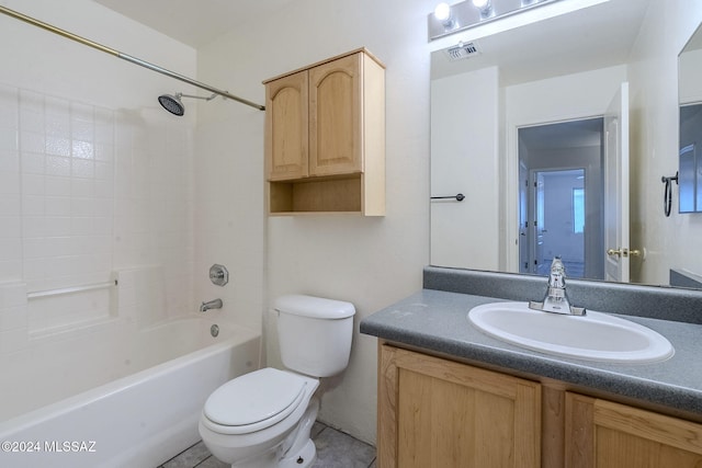 bathroom with shower / washtub combination, visible vents, vanity, and toilet